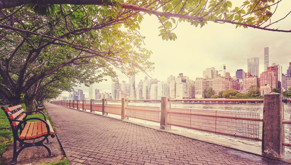 Color toned picture of walking path in Roosevelt Island, NYC.