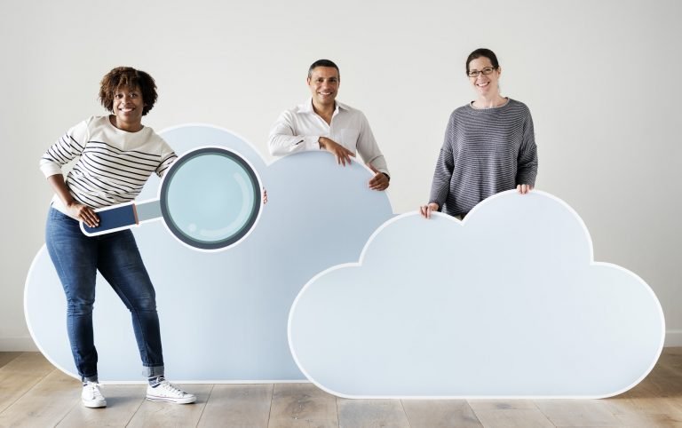 Happy people with cloud and technology icons