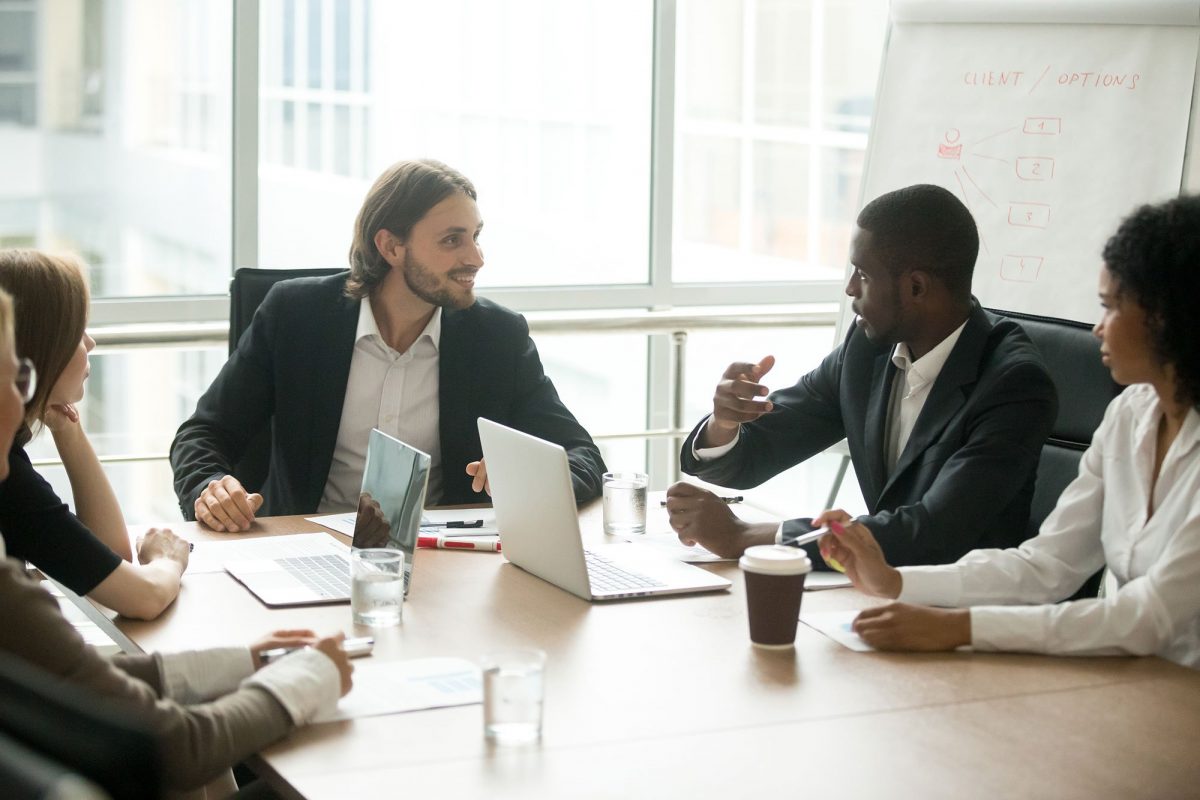 business-executives-discussing-project-ideas-at-te-LA7952R.jpg